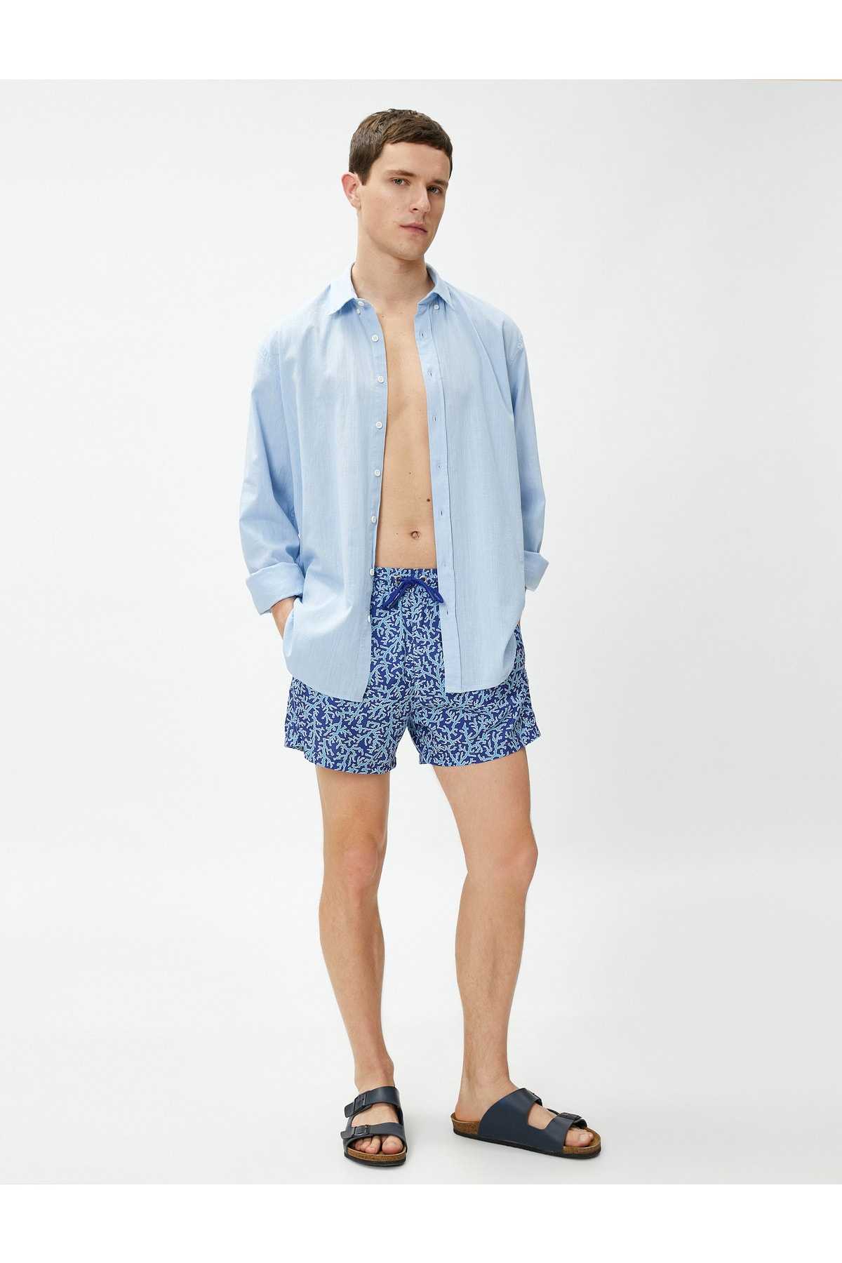 شلوارک شنا چاپ شده دور کمر با جزئیات جیب