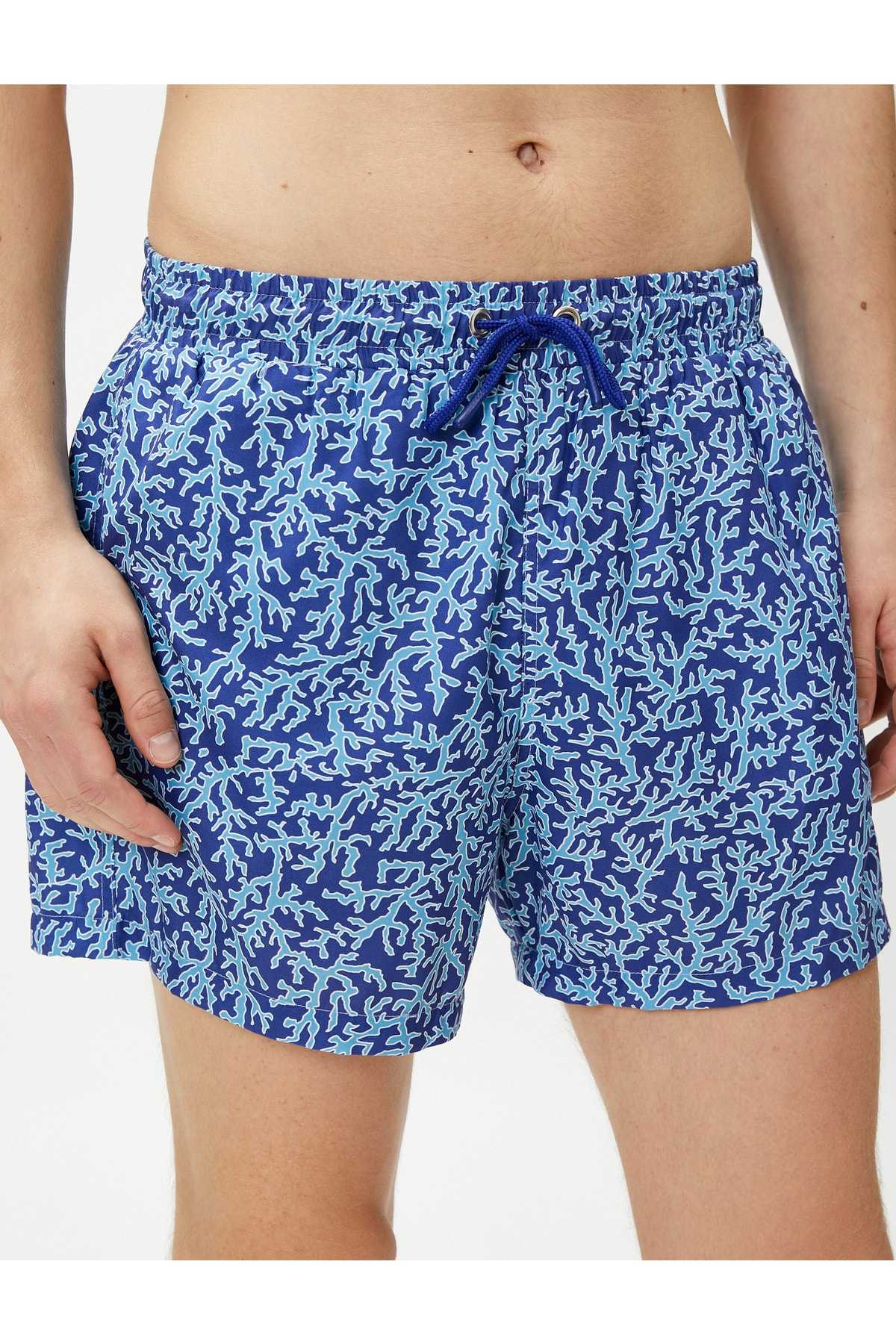 شلوارک شنا چاپ شده دور کمر با جزئیات جیب