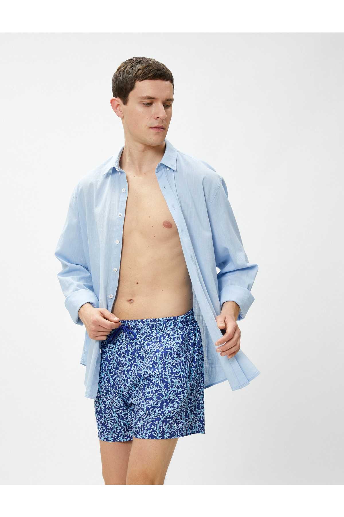 شلوارک شنا چاپ شده دور کمر با جزئیات جیب