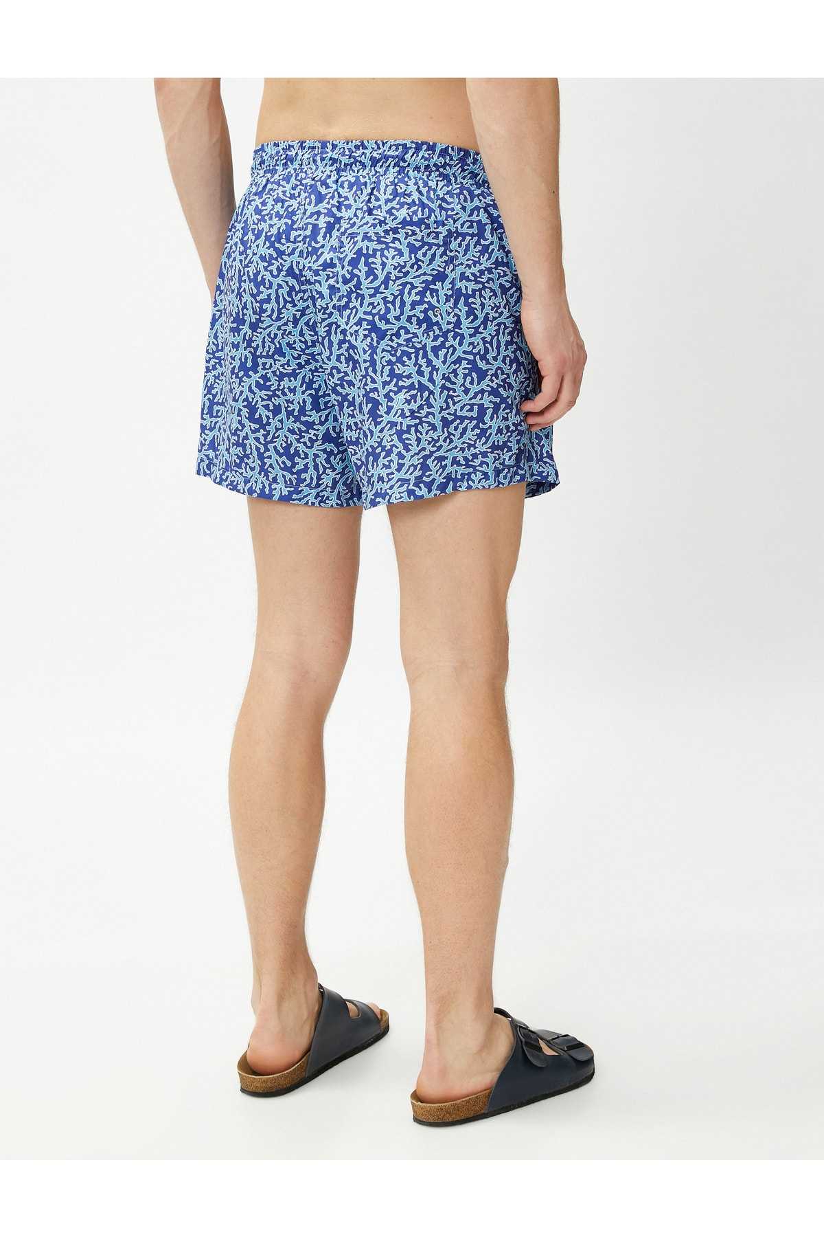 شلوارک شنا چاپ شده دور کمر با جزئیات جیب