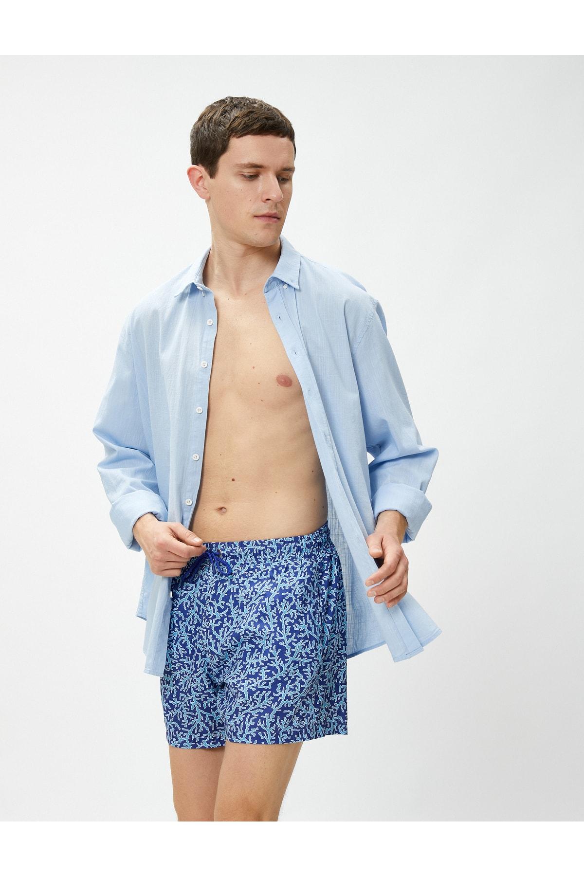 شلوارک شنا چاپ شده دور کمر با جزئیات جیب