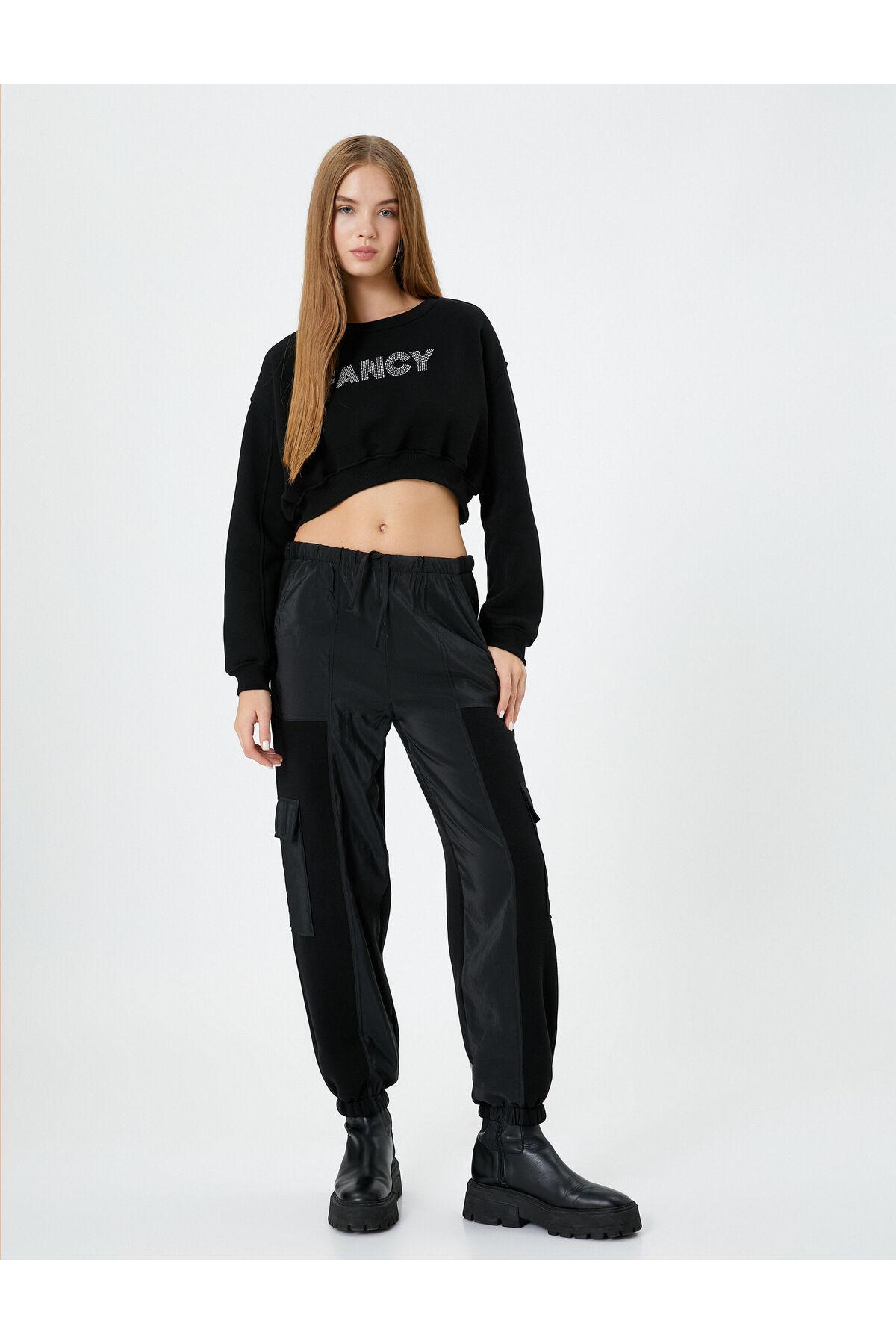 سویشرت کراپ آجدار آستین بلند یقه خدمه چاپ شده