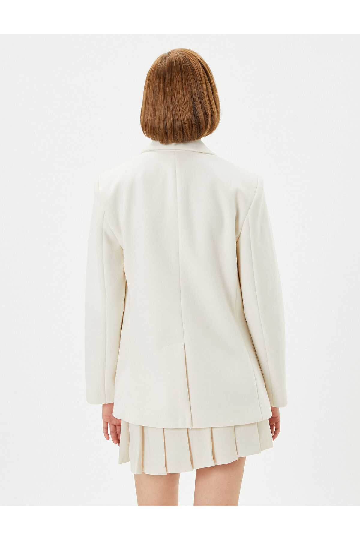 جیب تک دکمه ژاکت بلیزر با جزئیات