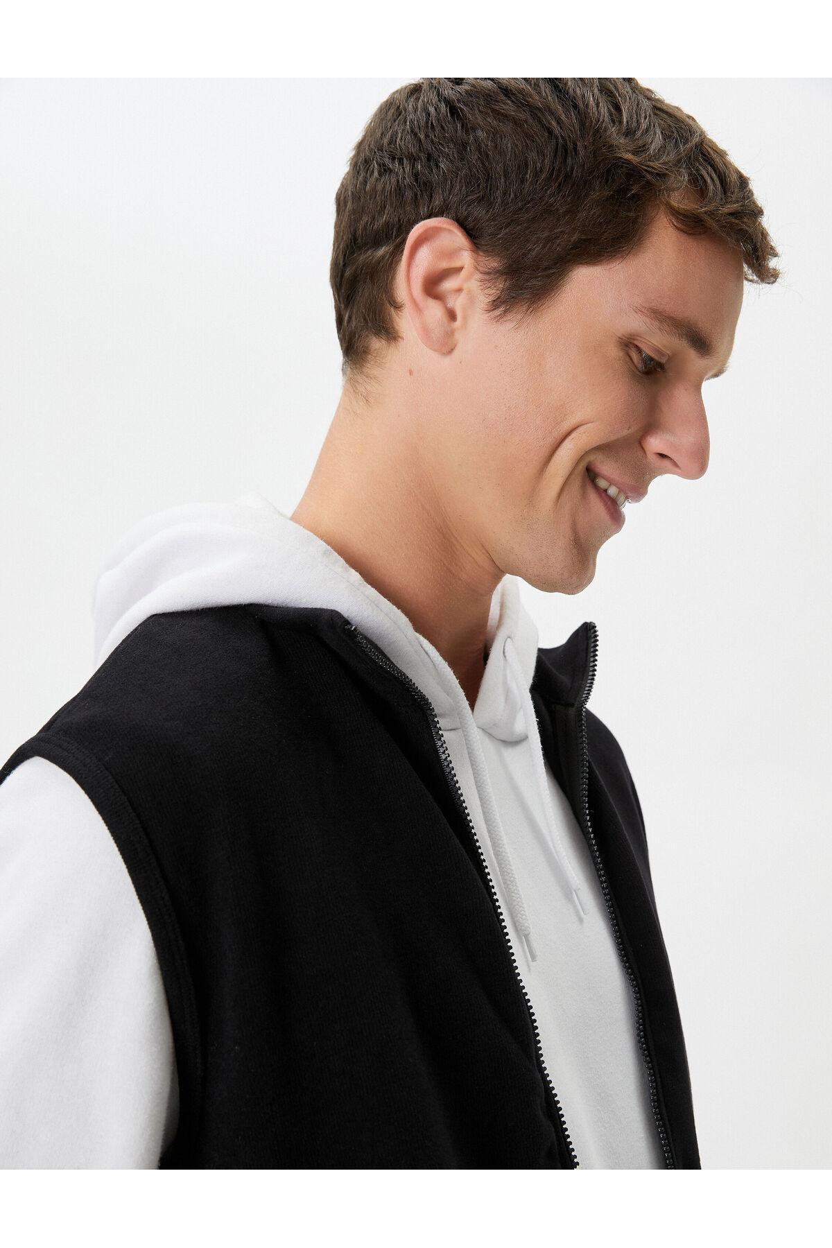 جلیقه یقه زیپ دار جیبی کانگورو بدون آستین