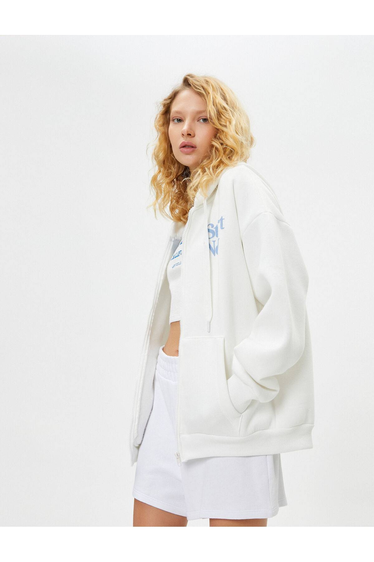 سویشرت زیپ دار پشت سرپوش دار با چاپ جیبی ترکیبی از پنبه