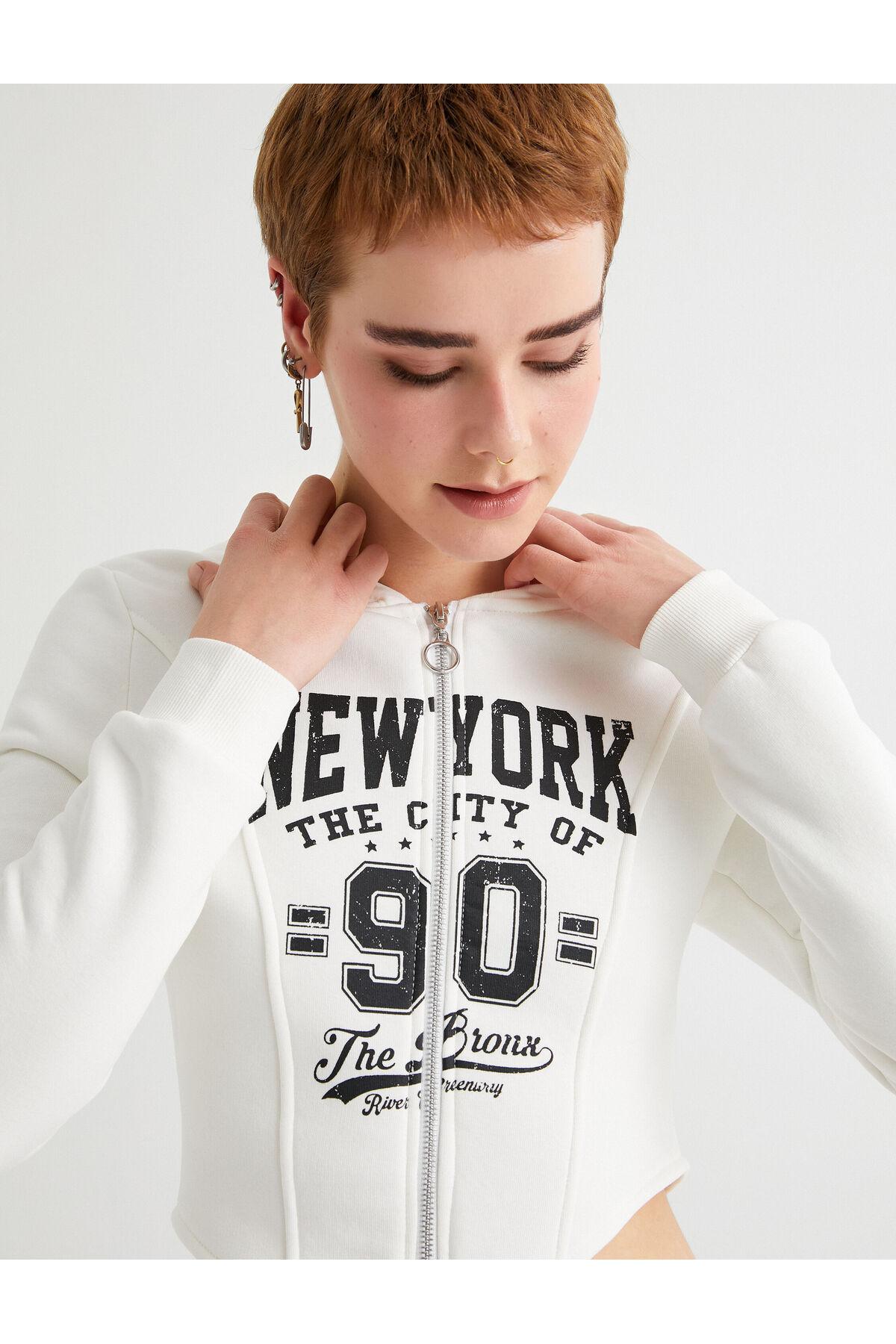 بلوز زیپ دار کلاهدار کالج با تم آستین بلند تناسب اندام