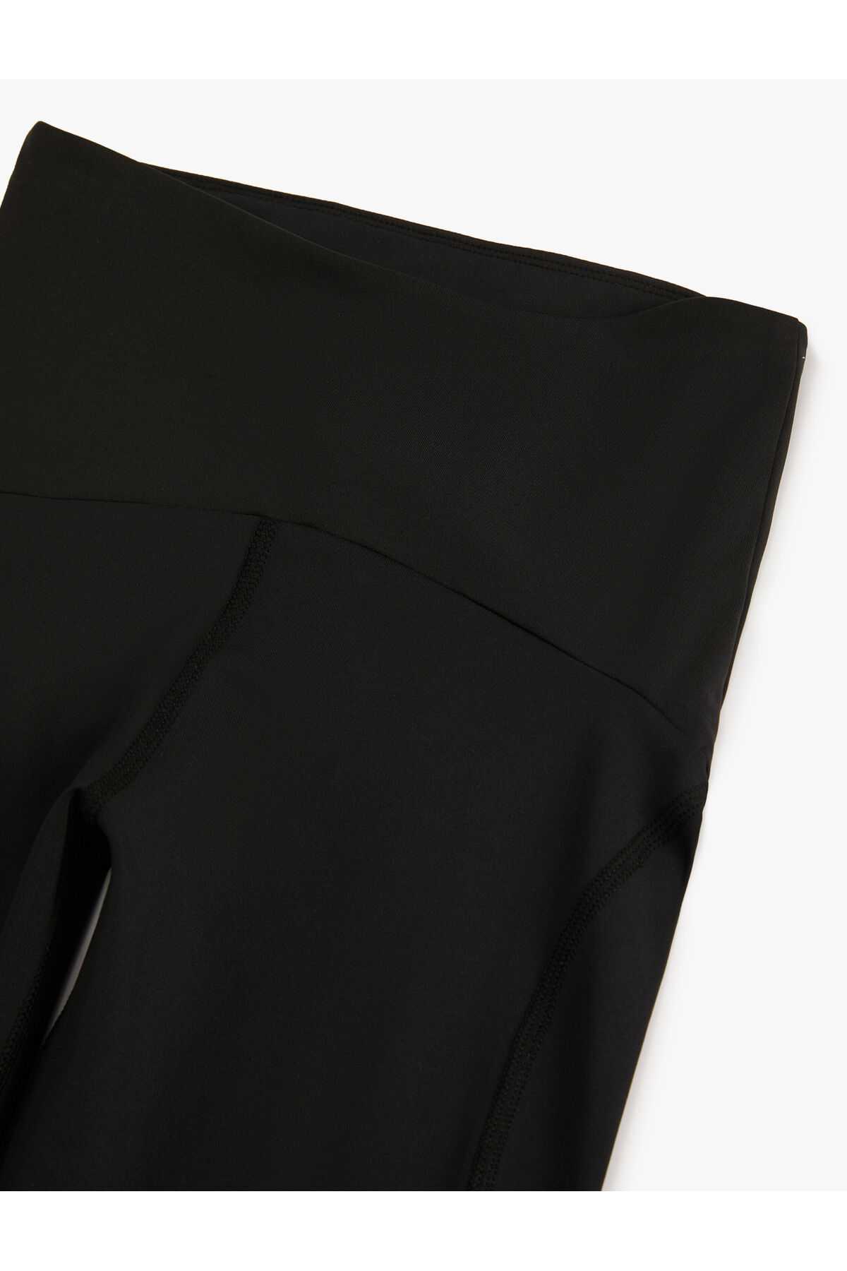 شلوار ساق بلند اسپرت باریک با جزئیات دوخت