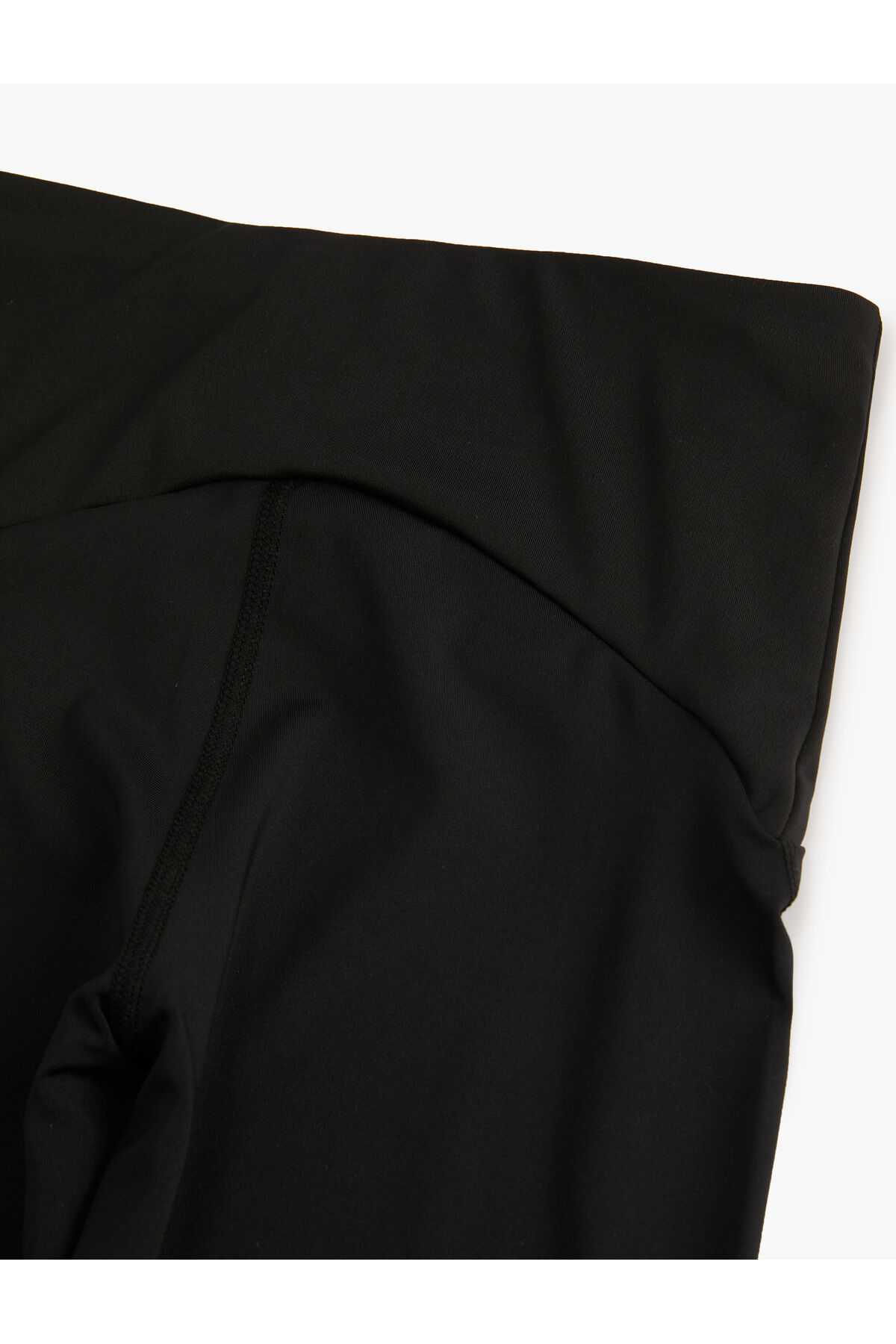 شلوار ساق بلند اسپرت باریک با جزئیات دوخت