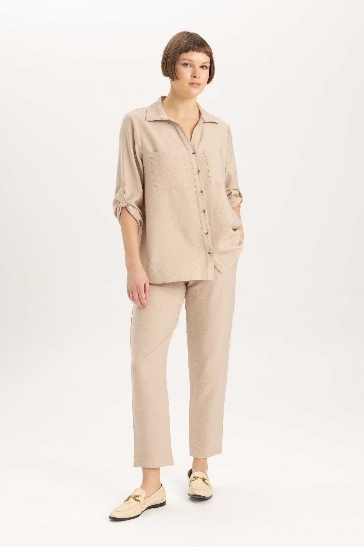 شلوار کتانی کمر بلند با جیب های جاگر