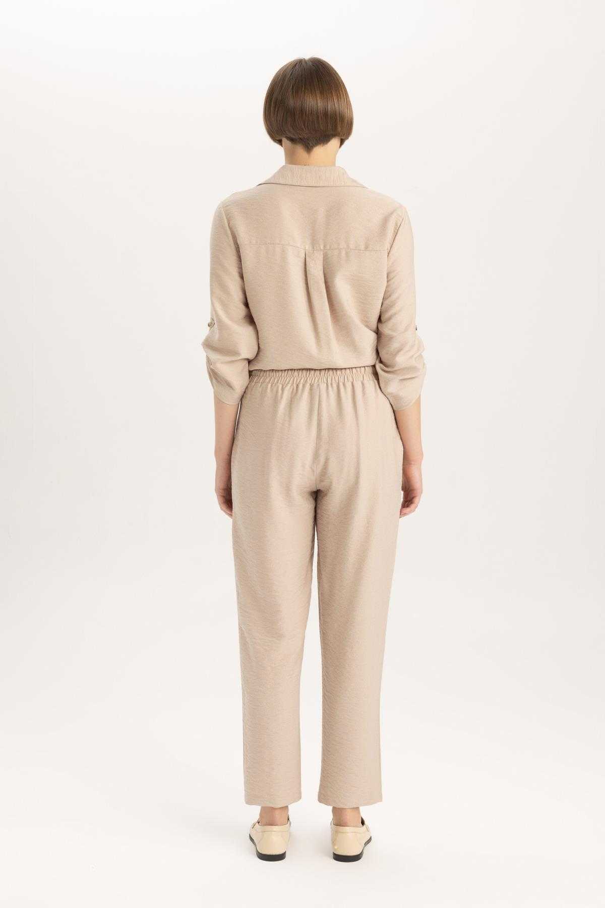 شلوار کتانی کمر بلند با جیب های جاگر