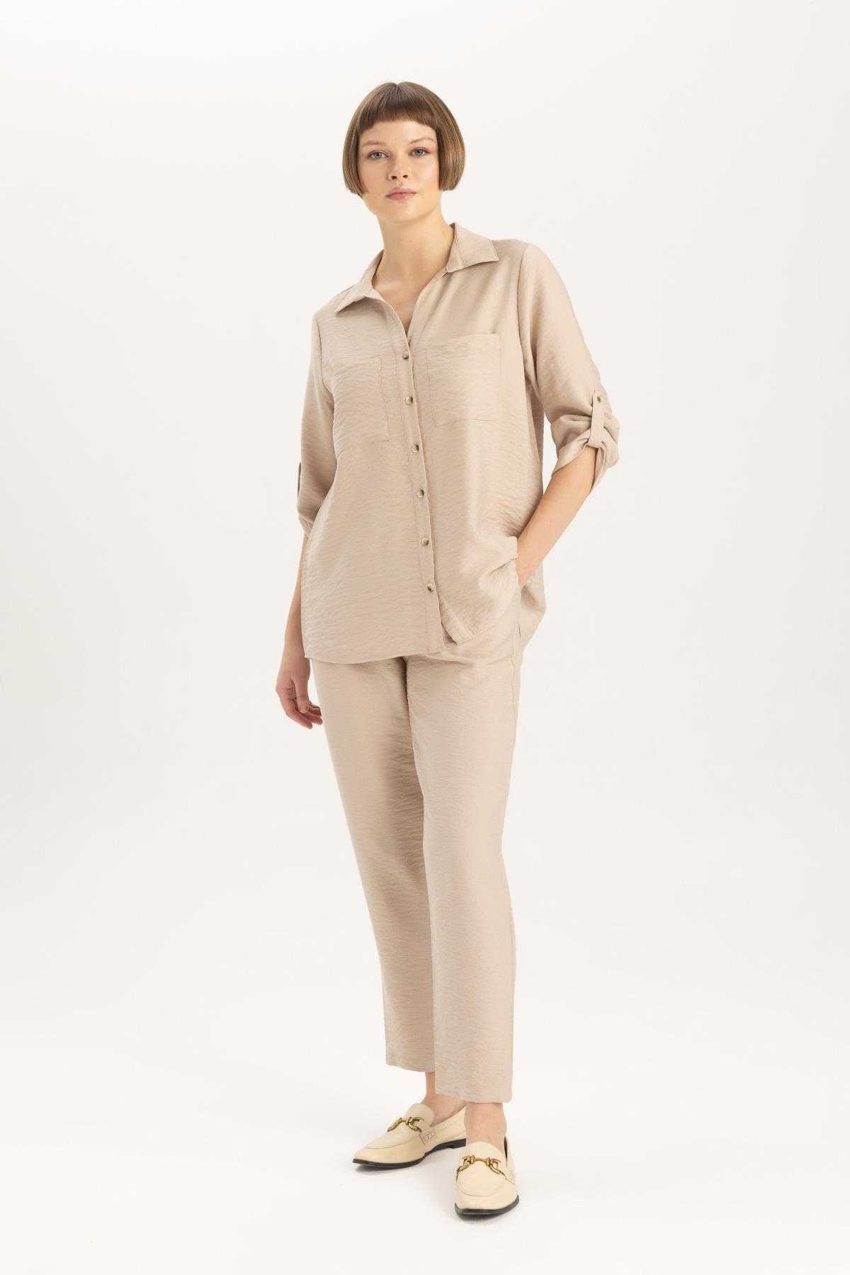 شلوار کتانی کمر بلند با جیب های جاگر