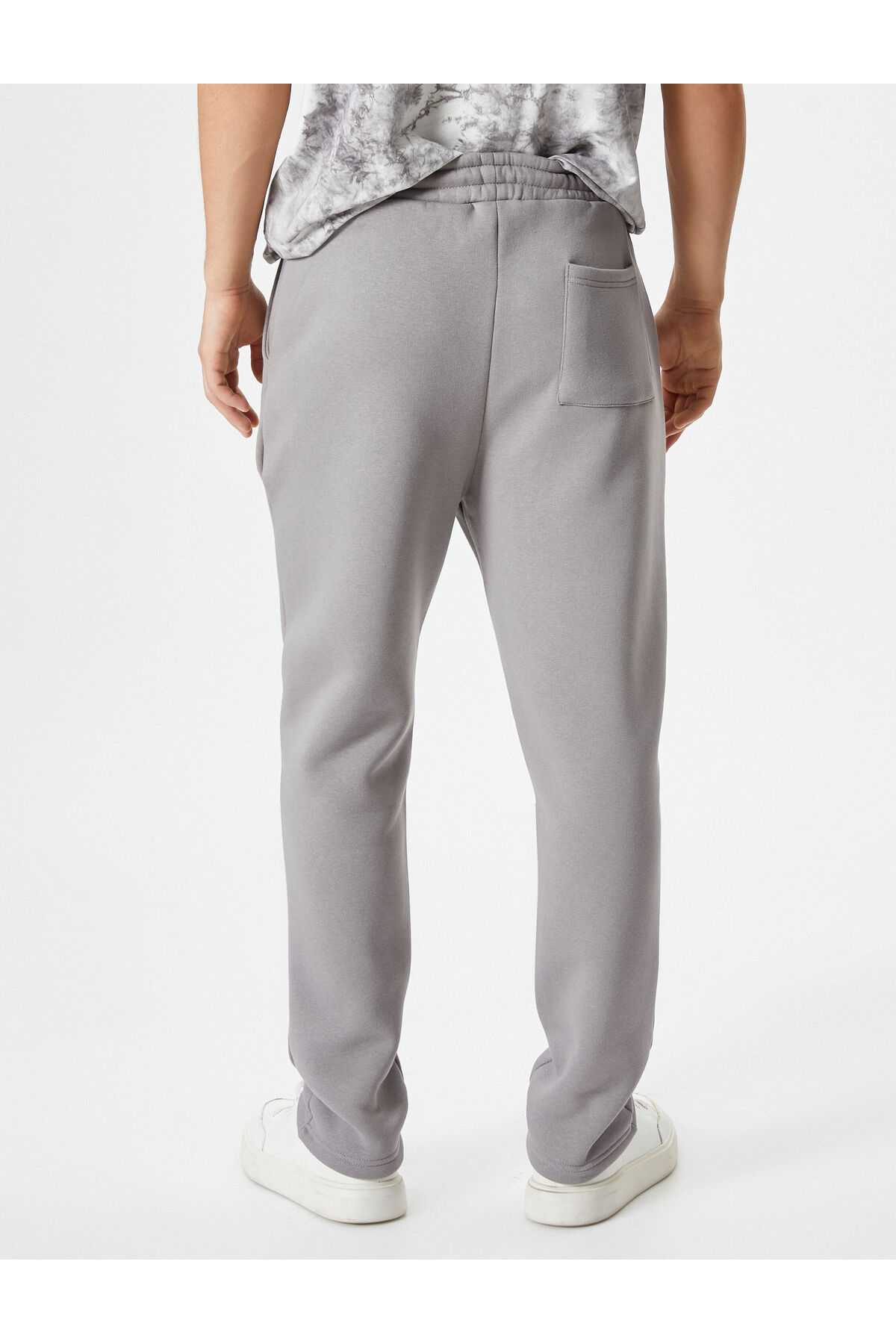 شلوار ورزشی پایه با جزئیات جیب و کمر بسته