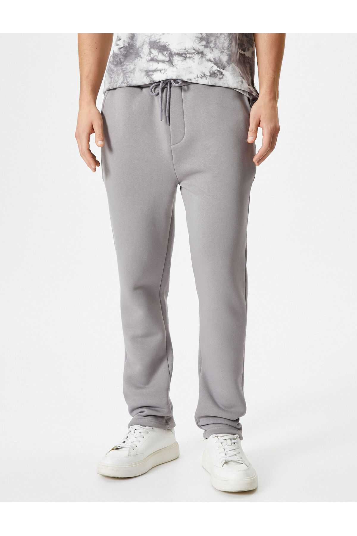 شلوار ورزشی پایه با جزئیات جیب و کمر بسته