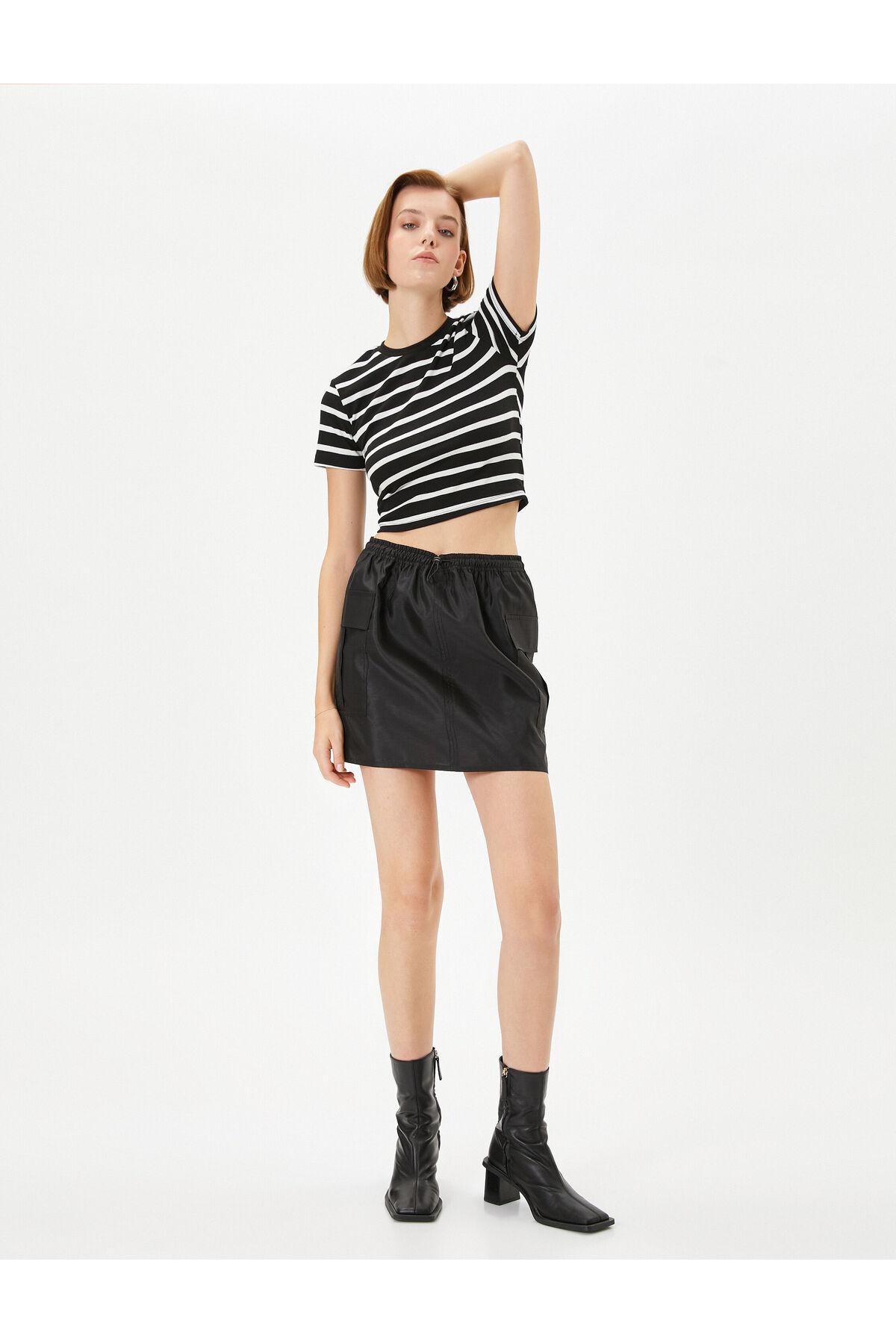 دامن چتر نجات گره خورده در کمر مینی، در بسته، جیب دار