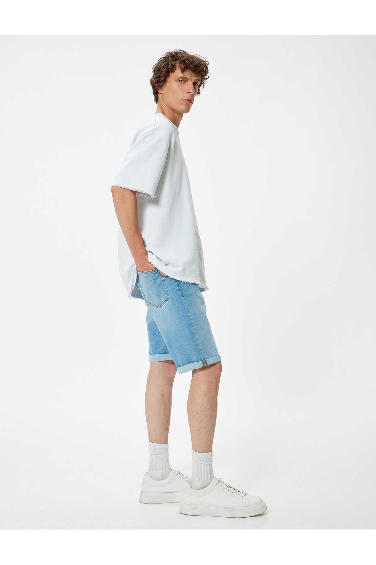 شلوارک جین باریک با دکمه کاف تاشو برمودا