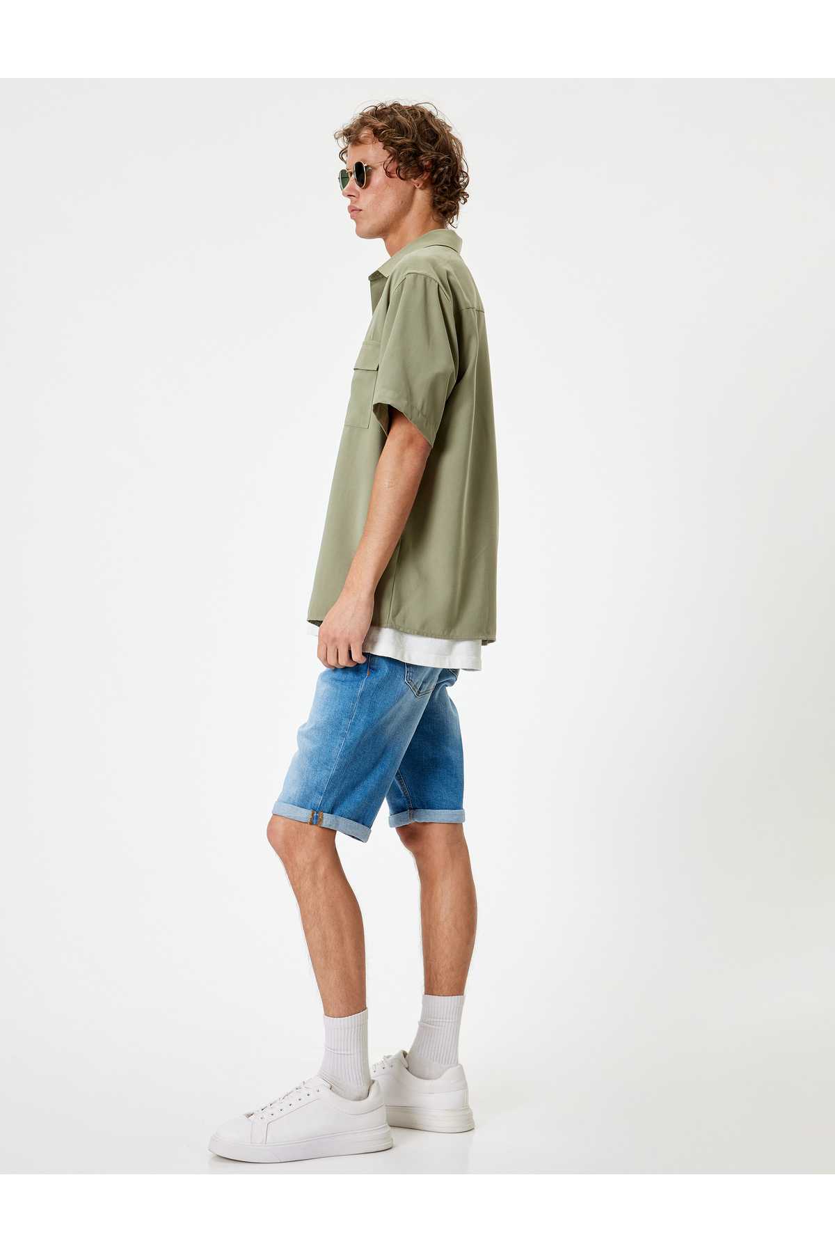 شلوارک جین باریک با دکمه کاف تاشو برمودا