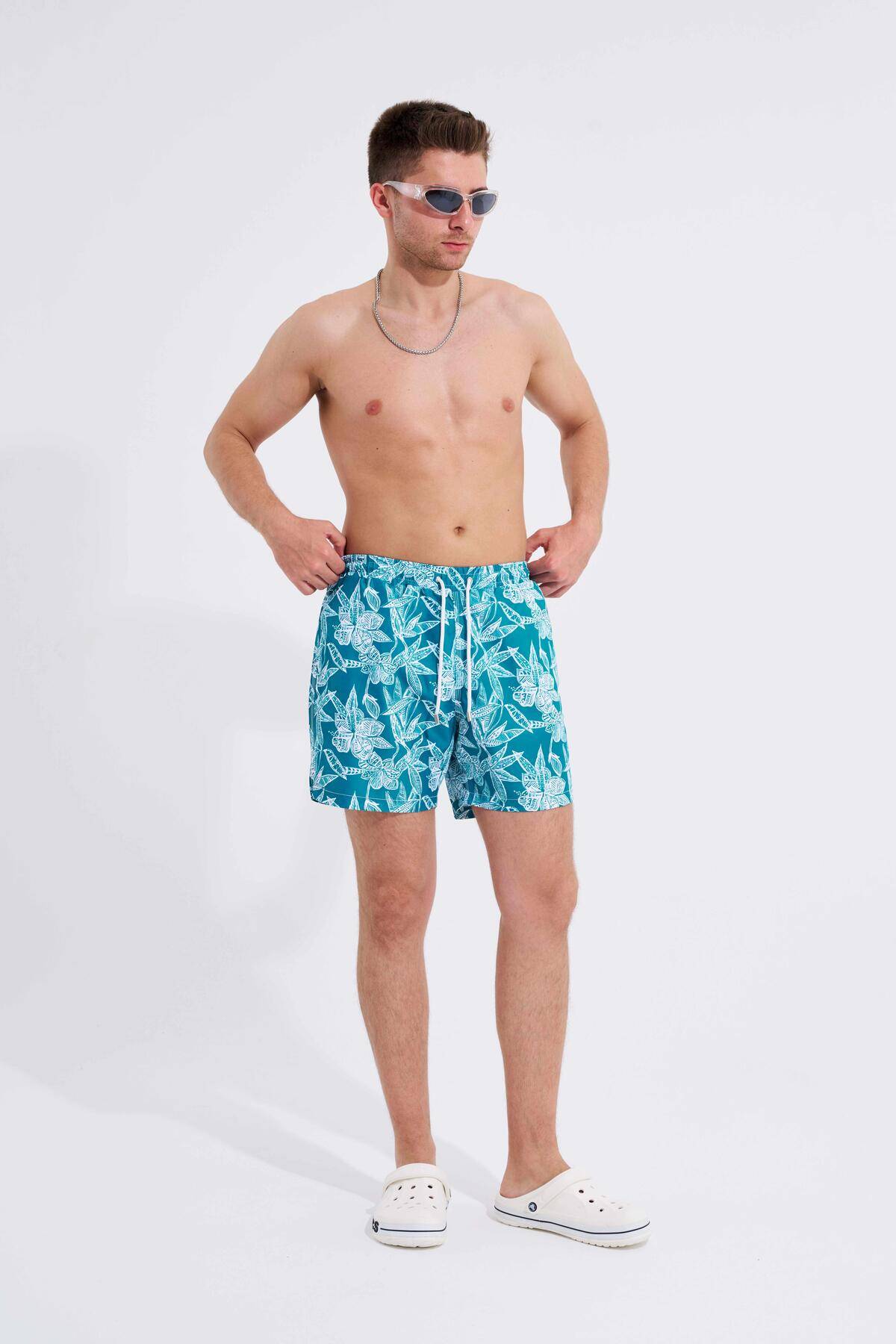 شلوار شنای سبز با چاپ گل مردانه