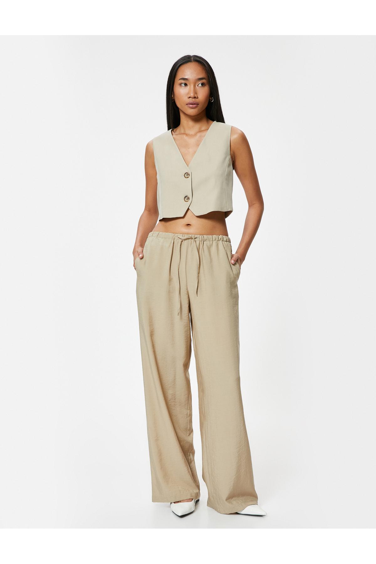 شلوار گشاد، جیب پارچهای مدال، کمربند