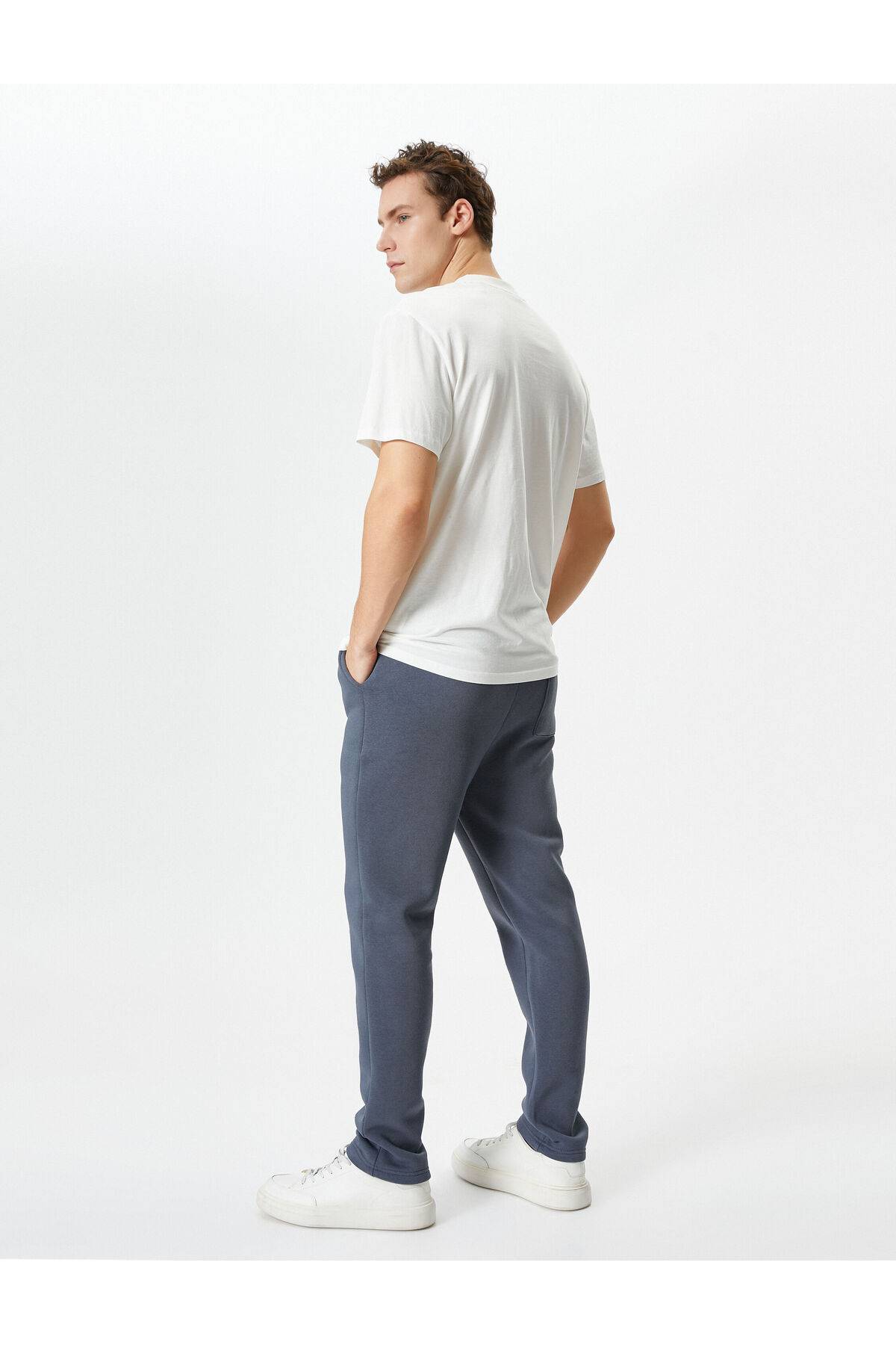 شلوار ورزشی پایه با جزئیات جیب و کمر بسته