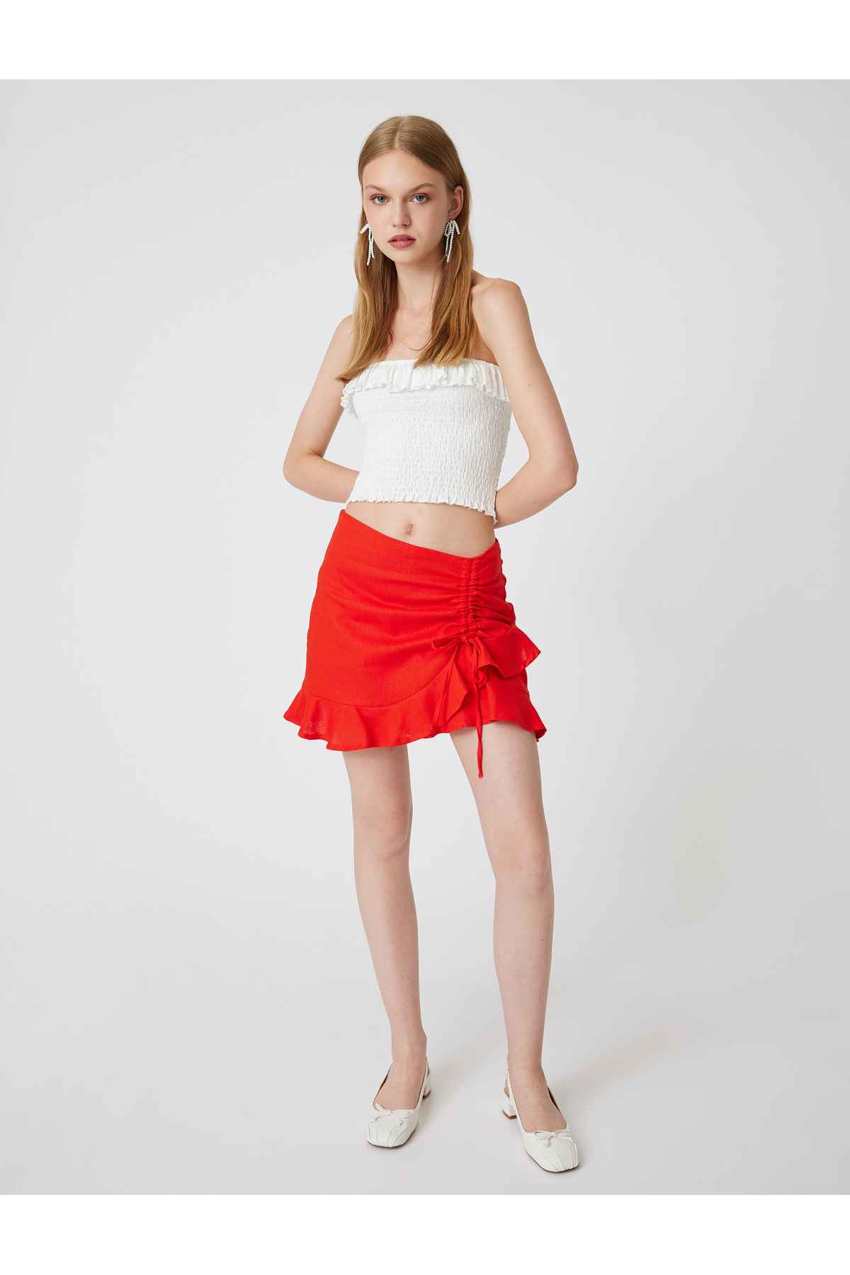 دامن کوتاه کتانی ژولیده باریک با جزئیات پاپیون