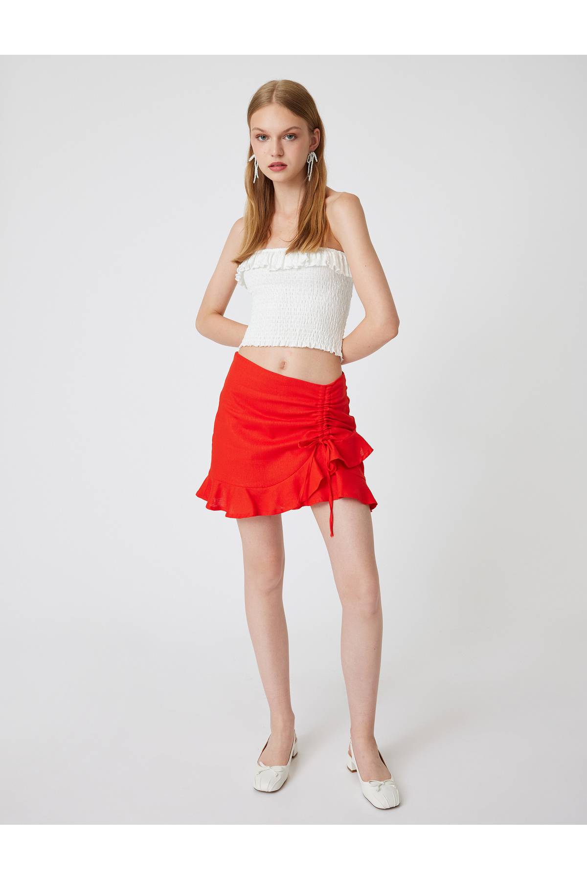 دامن کوتاه کتانی ژولیده باریک با جزئیات پاپیون