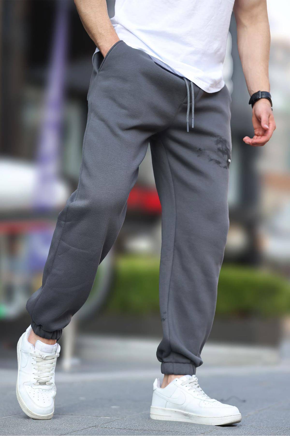 شلوار ورزشی جیبی الاستیک مردانه بژ با چاپ جزئیات