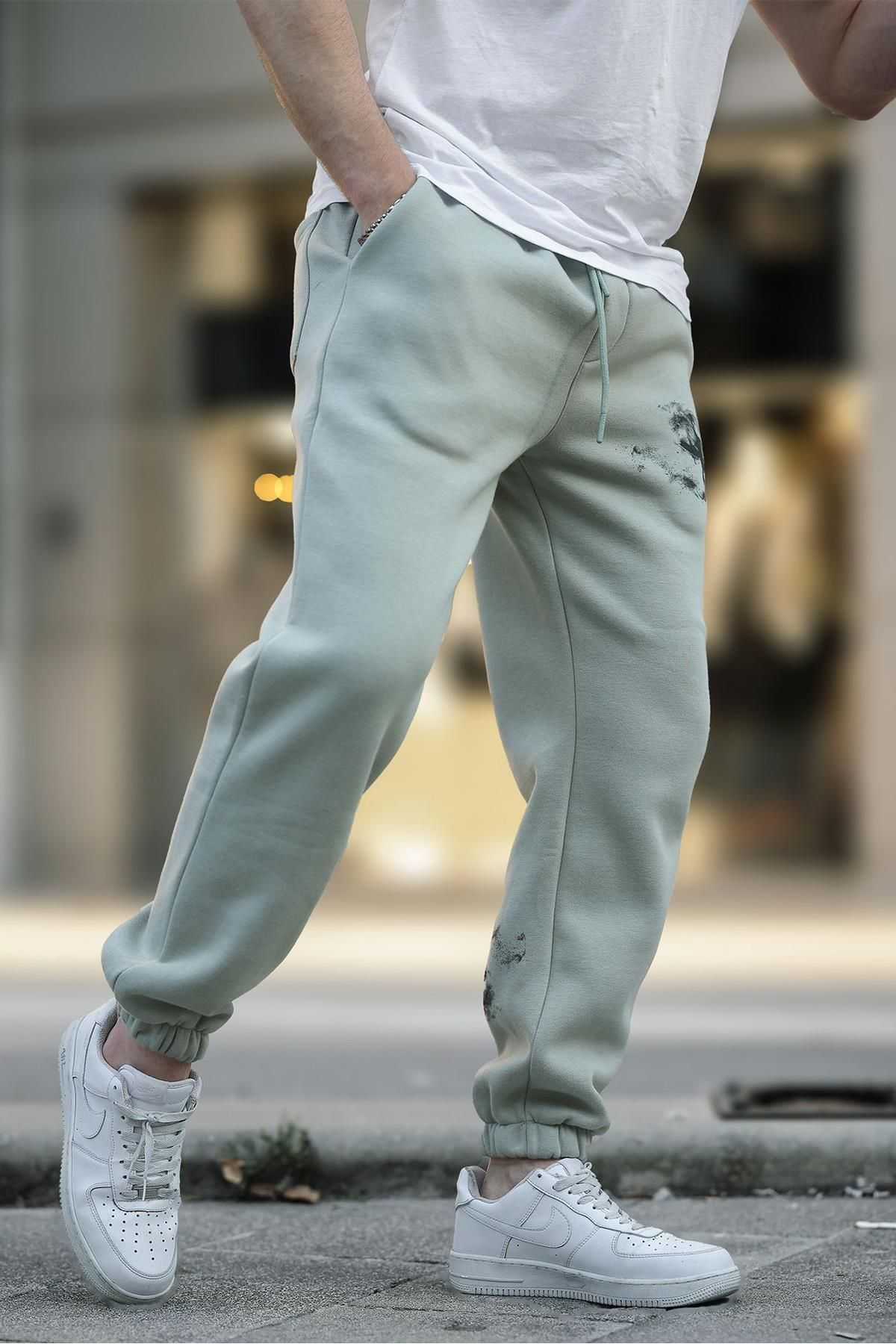 شلوار ورزشی جیبی الاستیک مردانه بژ با چاپ جزئیات