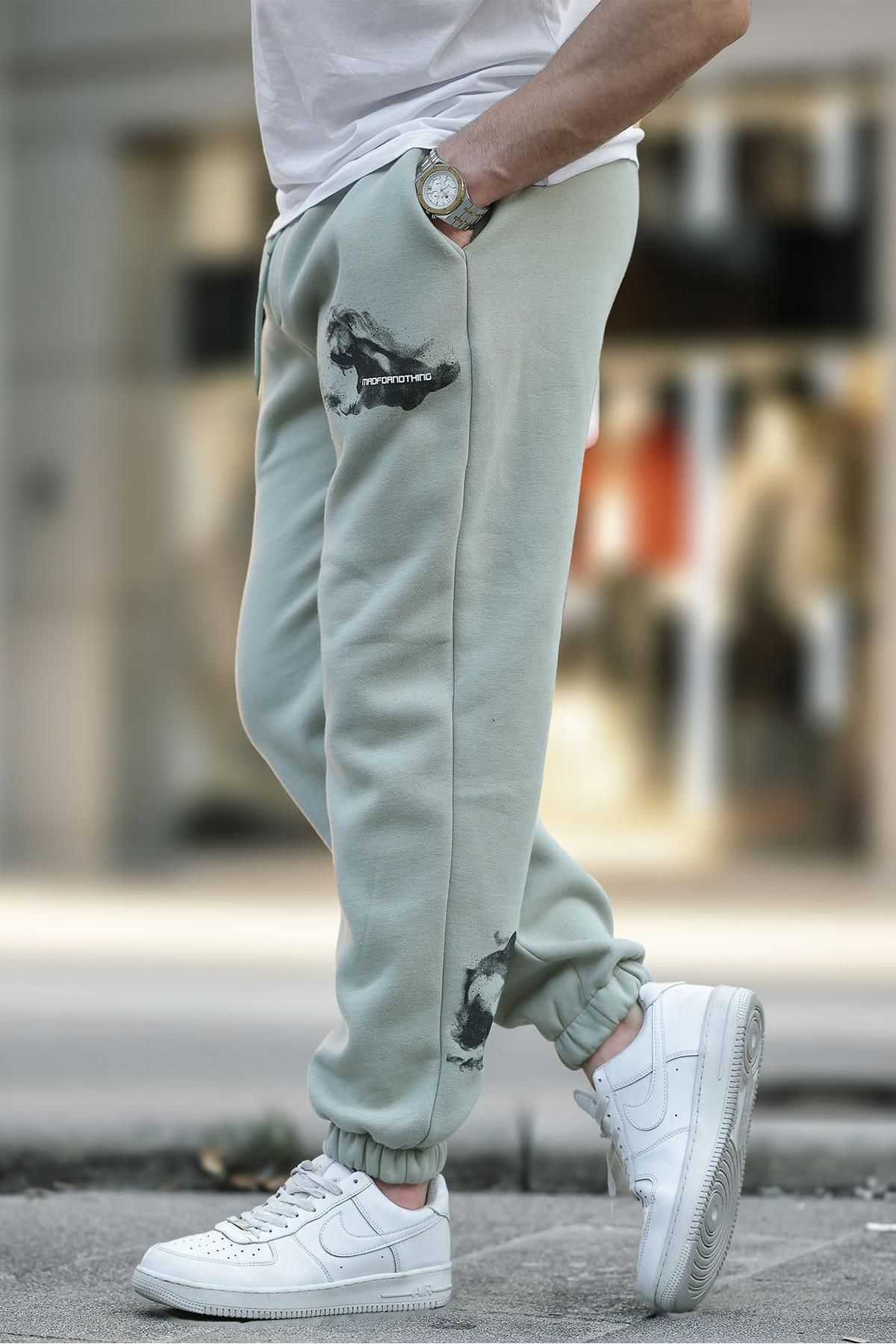 شلوار ورزشی جیبی الاستیک مردانه بژ با چاپ جزئیات