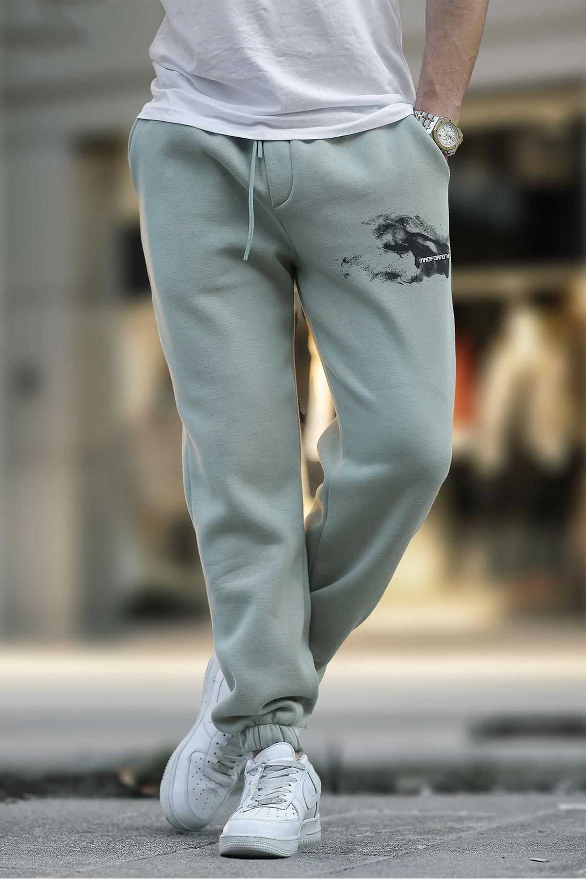 شلوار ورزشی جیبی الاستیک مردانه بژ با چاپ جزئیات