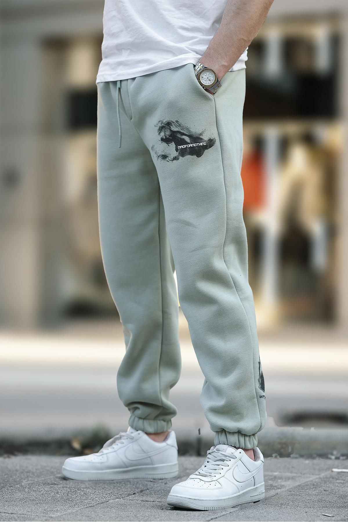 شلوار ورزشی جیبی الاستیک مردانه بژ با چاپ جزئیات