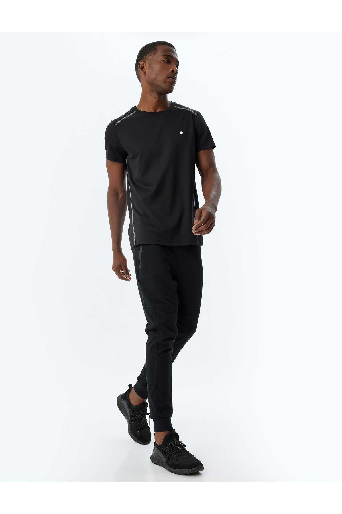 شلوار ورزشی اسپرت دوخت توری دور کمر ترکیبی پنبه ای با جزئیات