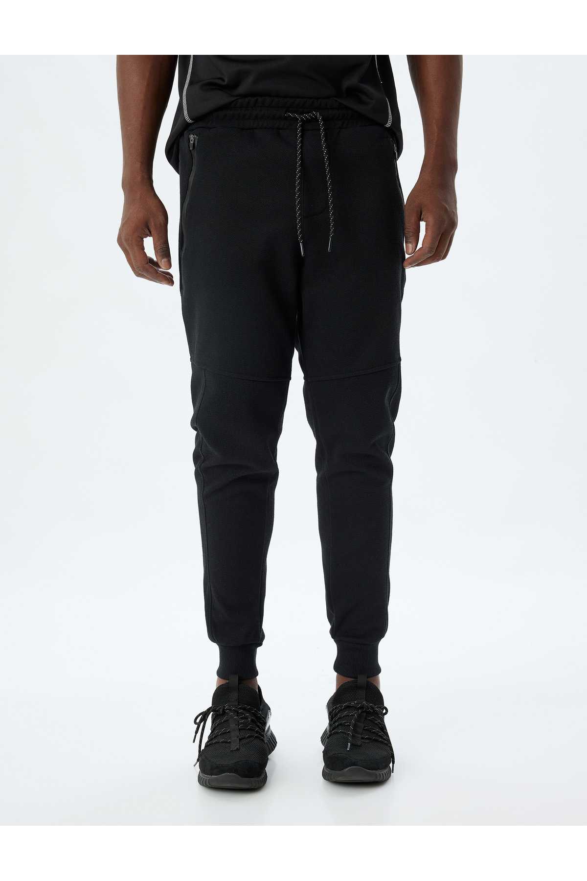 شلوار ورزشی اسپرت دوخت توری دور کمر ترکیبی پنبه ای با جزئیات