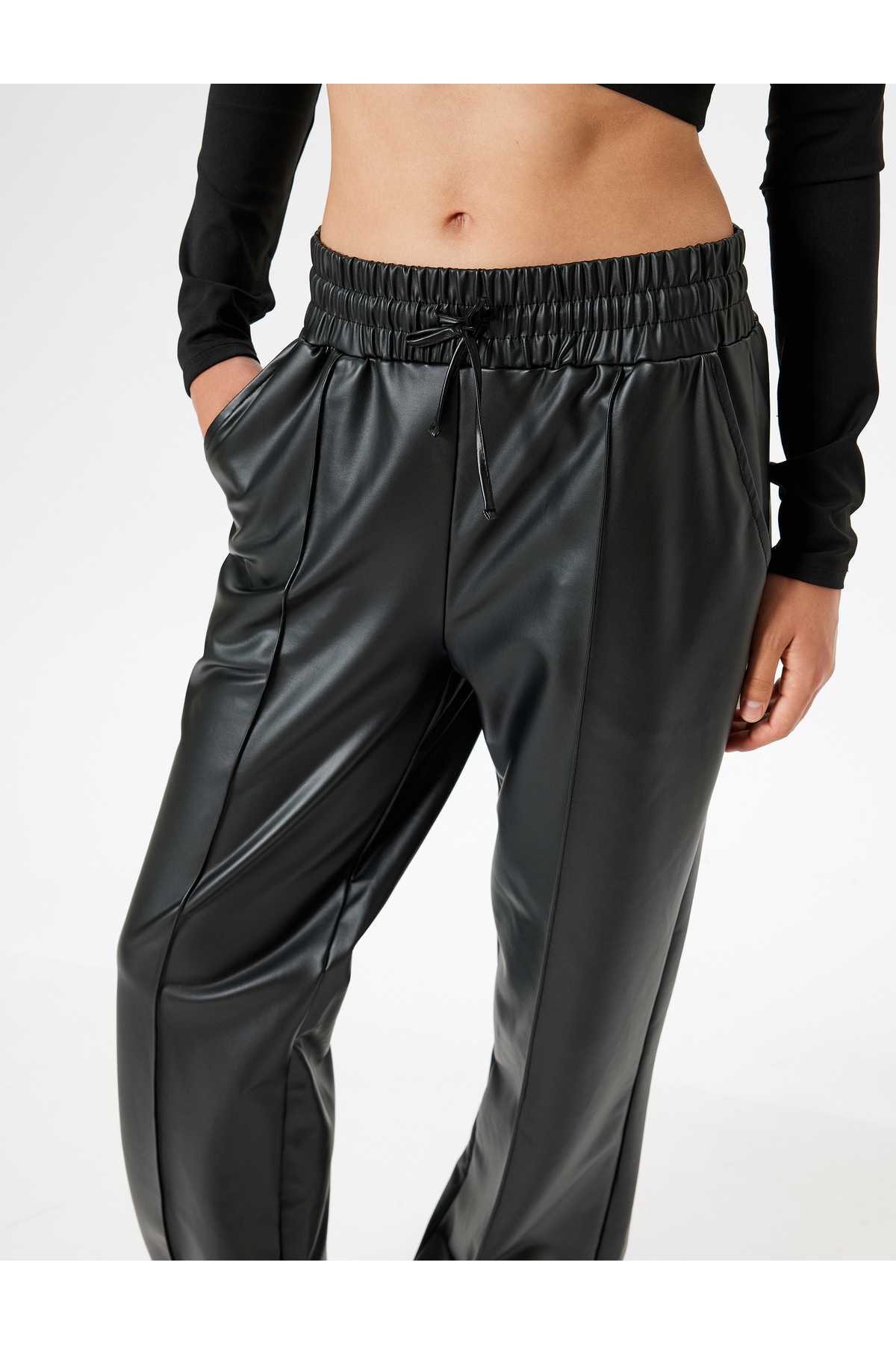 شلوار گرمکن چرم مصنوعی توری دور کمر آجدار جیب راست راست