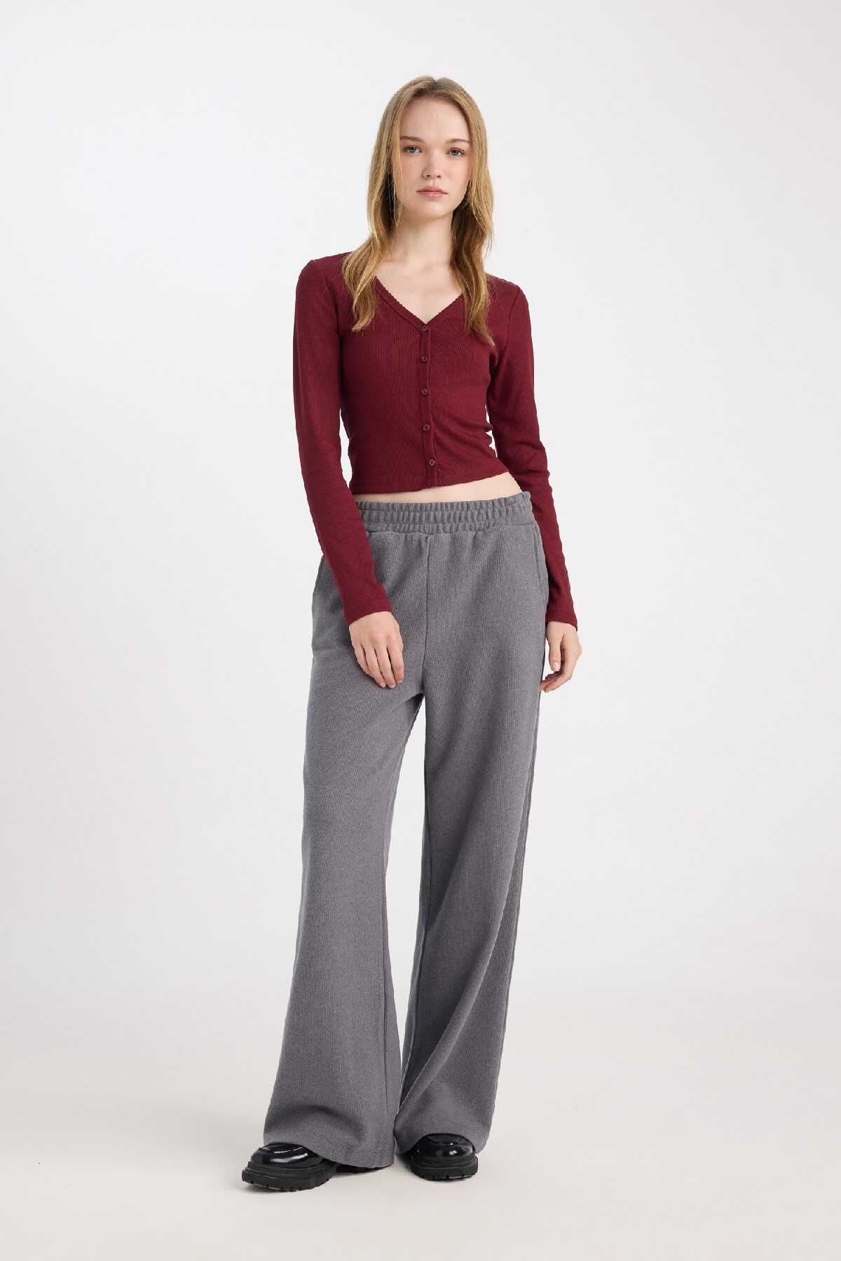 شلوار ورزشی بند دار بلند ساق پا گشاد