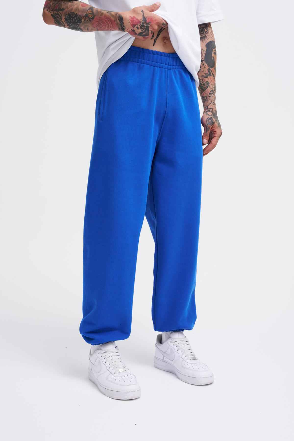 شلوار گرمکن آبی سرمه ای مورب پایه مردانه