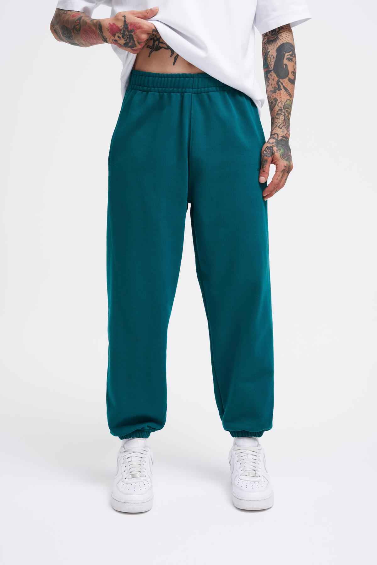 شلوار گرمکن آبی سرمه ای مورب پایه مردانه